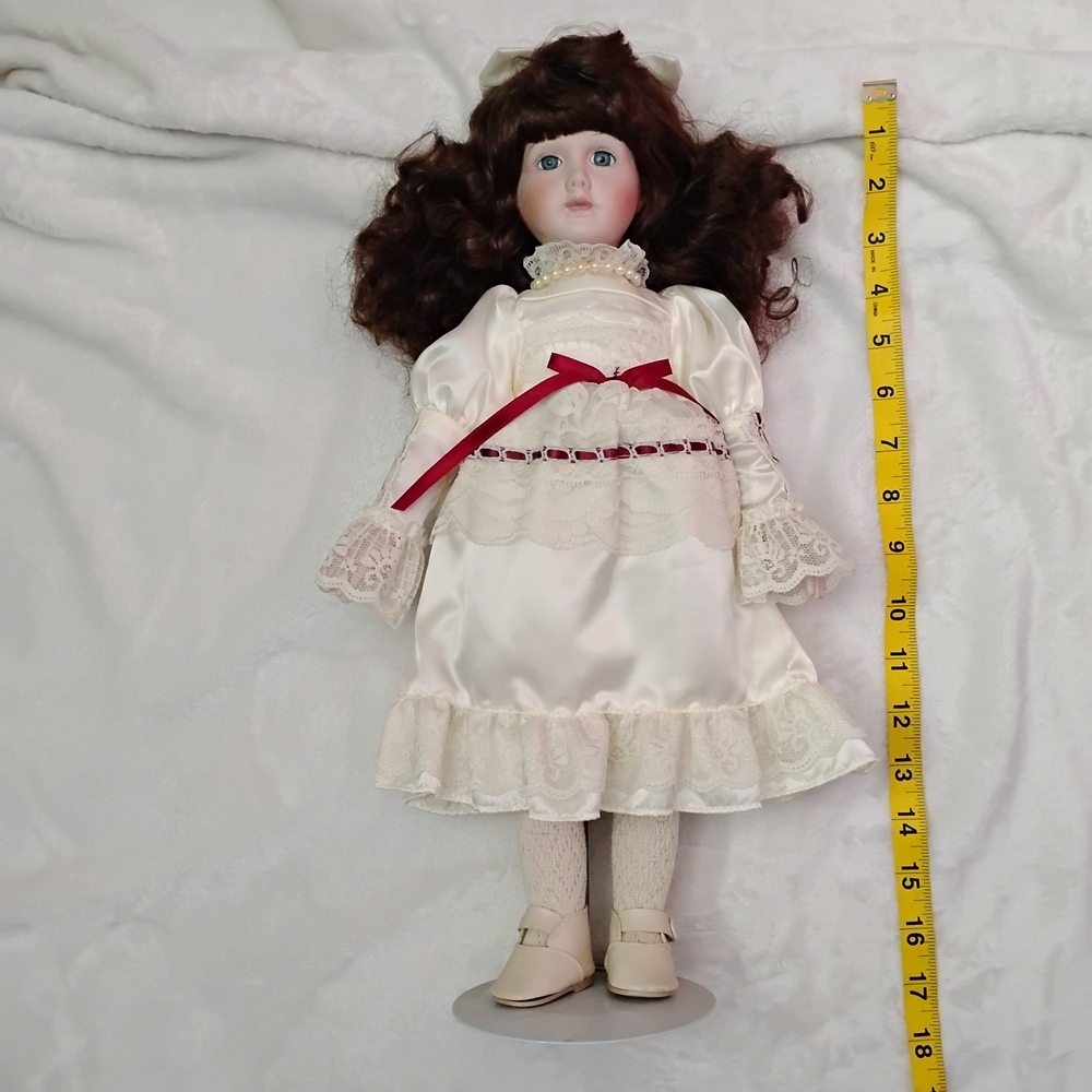 Cream and Red Doll with Elegant Accessories